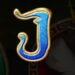 Symbol Písmeno J automatu Mirror Shield od SYNOT Games